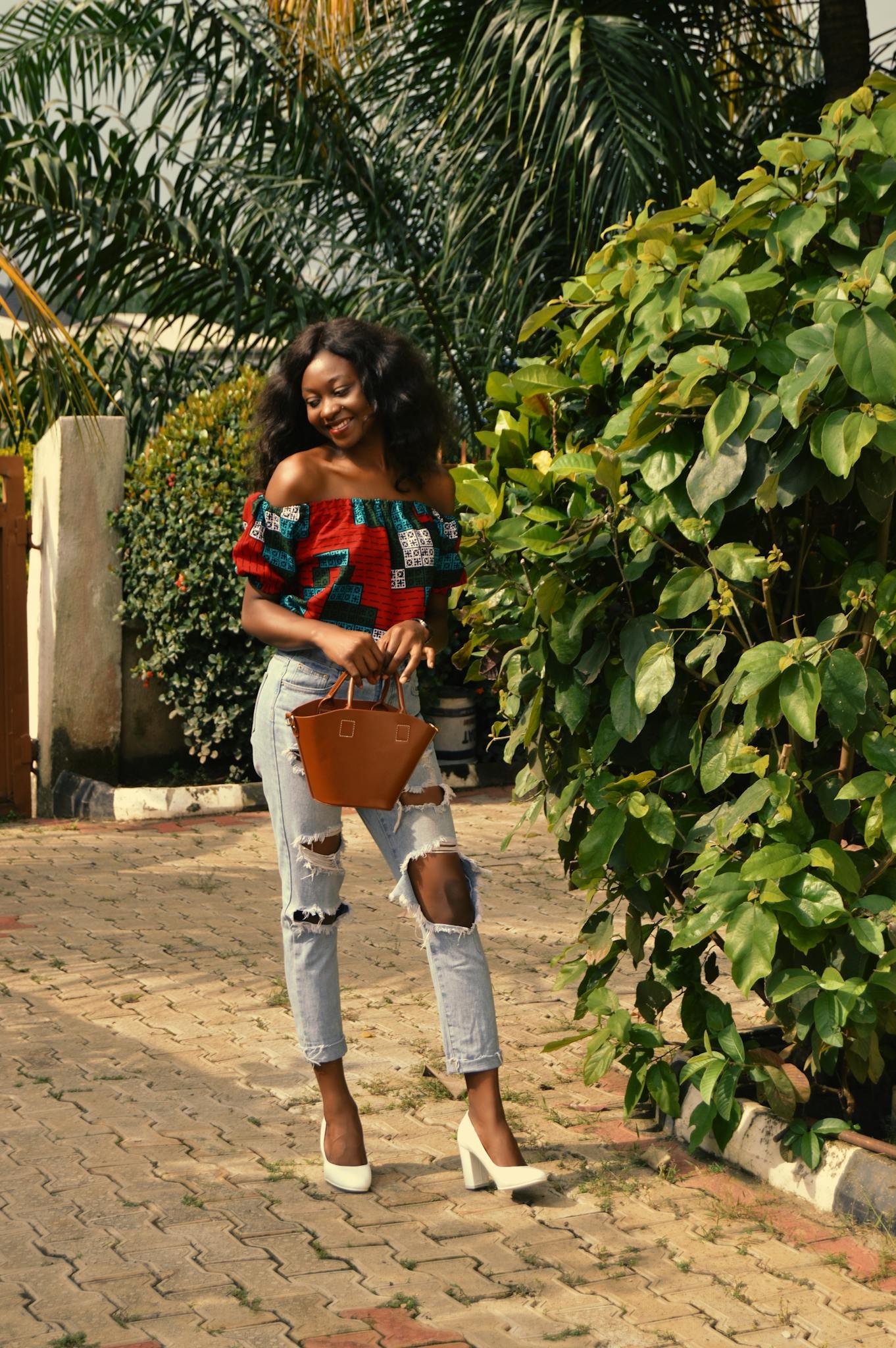 Woman Wearing Ripped Jeans